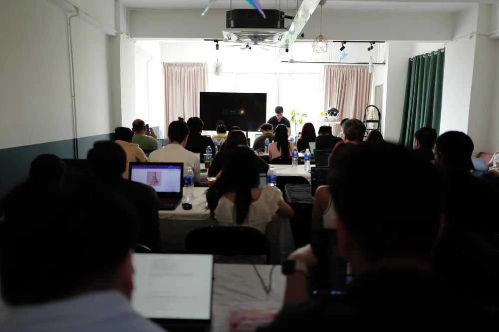 View from the back row, every screen on task